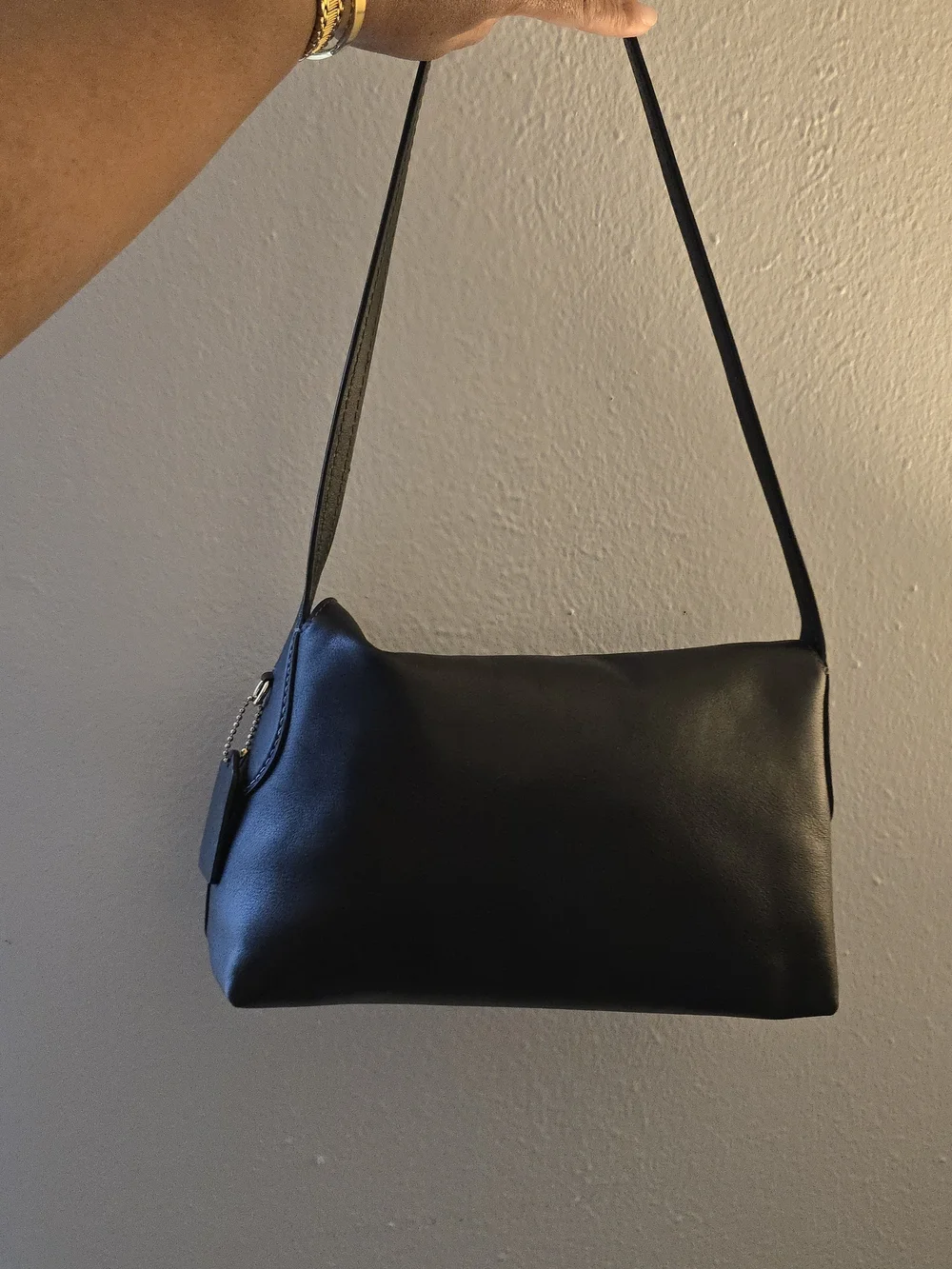 Coach sleek black